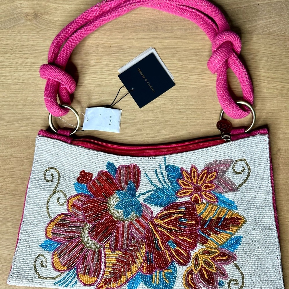 Pink Beaded Floral Handbag by America & Beyond